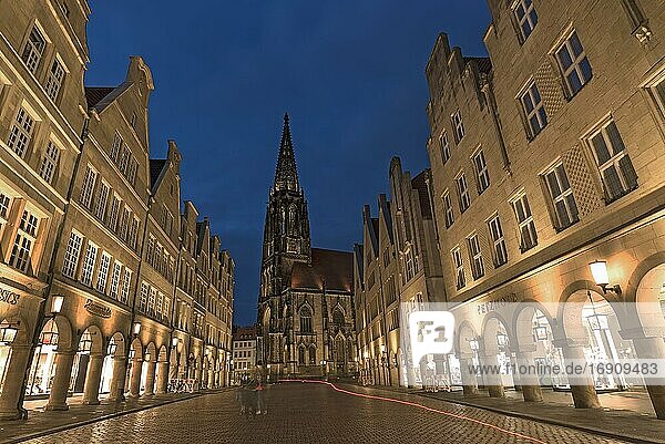 Illuminated historic gabled houses with St Lamberti Church  in the evening at blue hour  Prinzipalmarkt  Münster  North Rhine-Westphalia  Germany  Europe