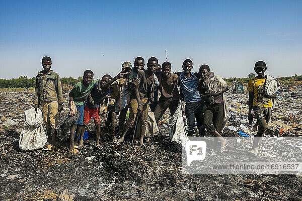 Local boys posing on a dump  Niamey  Niger  Africa