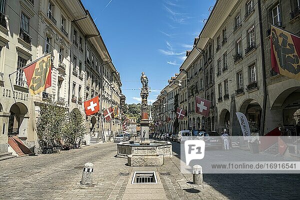 Simson fountain  flags on houses in the old town of Bern  Innere Stadt  Bern  Canton Bern  Switzerland  Europe
