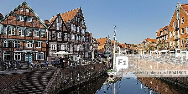 Historic houses at the Hanseatic harbour with sailing ship Willi  Old Town  Stade  Lower Saxony  Germany  Europe