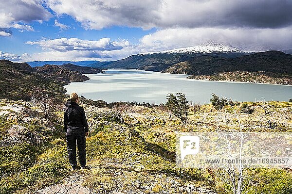 Hiker on day 4 of 4 of W Trek at Lake Grey (Lago Grey)  Torres del Paine National Park  Patagonia  Chile