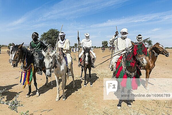 Colourful horse riders at a Tribal festival  Sahel  Chad  Africa