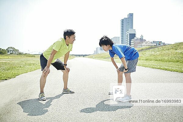 Japanese father and son training outdoors