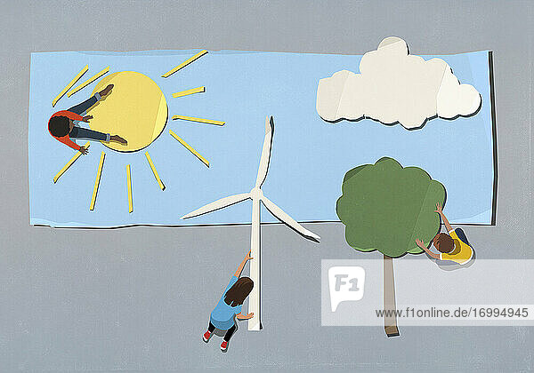 Kinder ordnen Umwelt- und Windradsymbole an