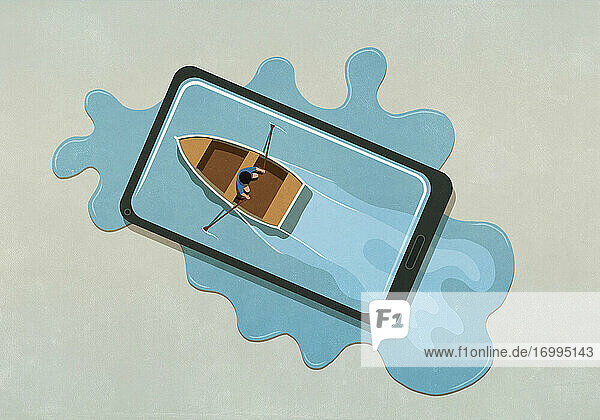 Mann rudert Boot in Wasser verschüttet von Smartphone