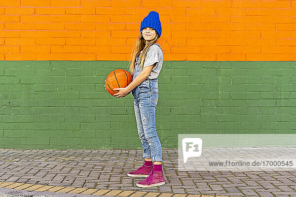 Young girl with basketball