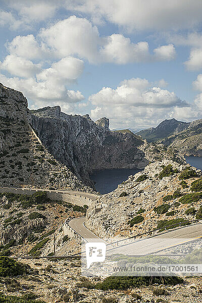 Empty road winding along edge of Cap de Formentor headland