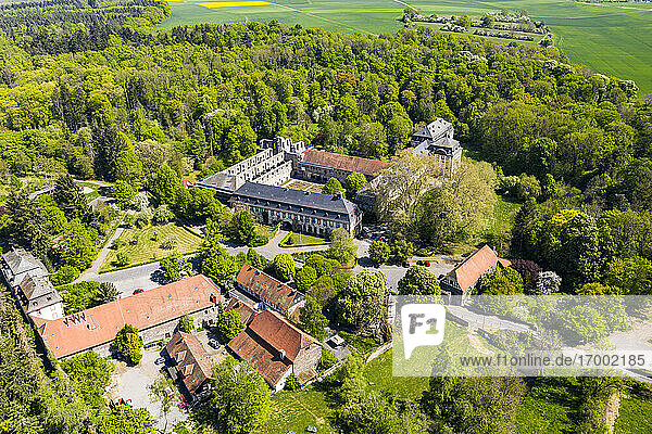 Deutschland  Hessen  Lich  Blick aus dem Hubschrauber auf das Kloster Arnsburg im Frühling