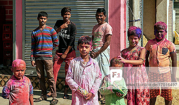 Kalna  West Bengal  India. Typical atmosphere in the city on the occasion of the Holi festival  when the young and the old are splashing with colored powder to celebrate the return of spring.