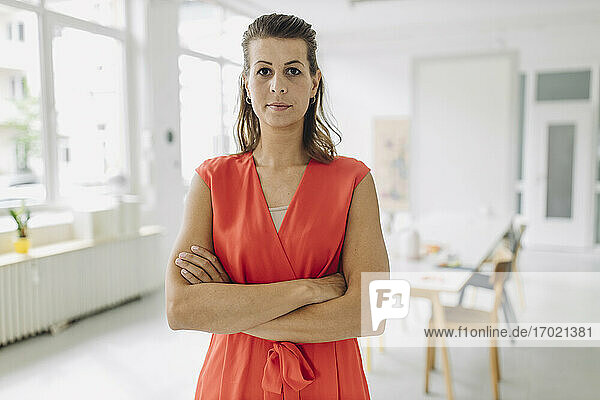 Portrait of businesswoman standing in office