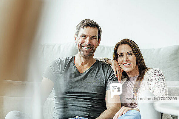 Happy mature couple at home