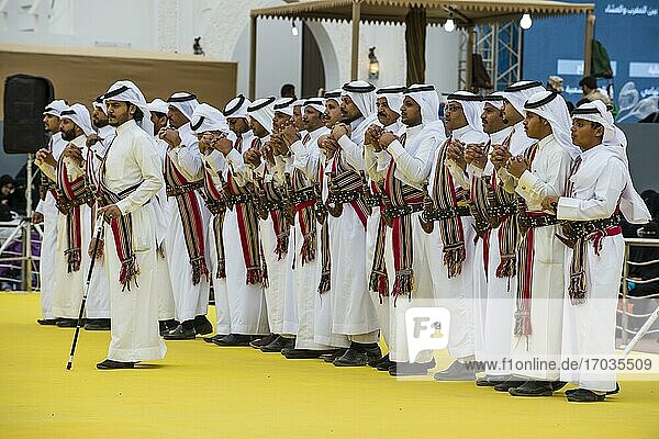 Traditional dressed local tribesmen dancing at the Al Janadriyah Festival  Riadh  Saudi Arabia  Asia