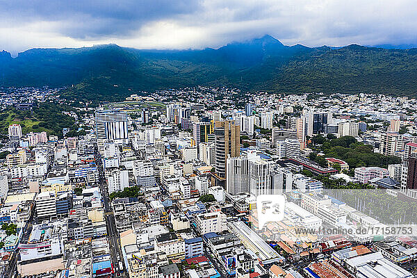 Cityscape against scenic view of mountain range at Port Louis  Mauritius