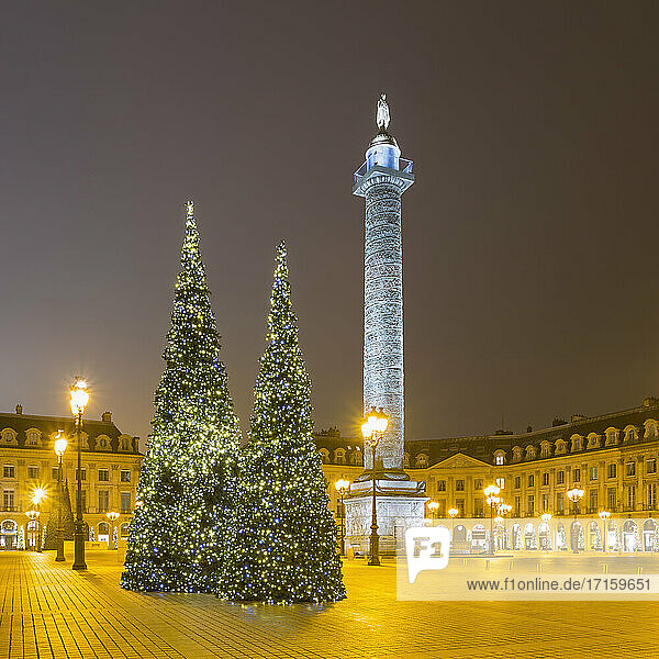 France  Ile-de-France  Paris  Christmas trees at illuminated Place Vendome during night