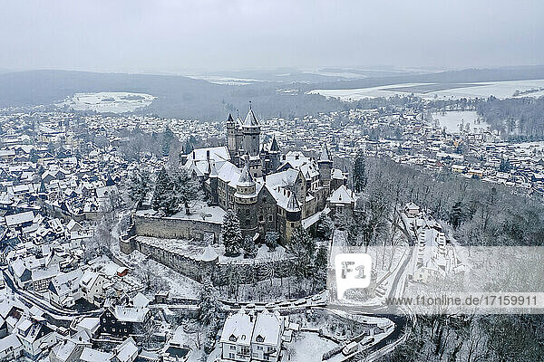 Germany  Hesse  Braunfels  Helicopter view of Braunfels Castle and surrounding town in winter