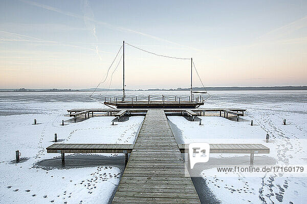 Germany  Brandenburg  Rangsdorf  Winter landscape with frozen lake