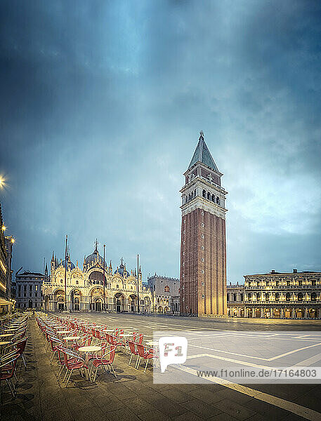 Italy  Veneto  Venice  Saint Marks Campanile standing on empty Piazza San Marco at dusk