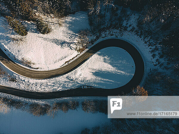 Aerial view of hairpin curve of empty alpine road  Germany