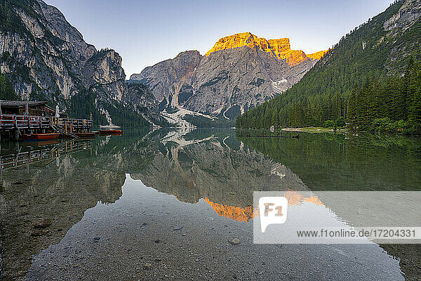 Beautiful view of Pragser Wildsee lake by Croda del Becco mountain during sunrise at Dolomites  Alto Adige  Italy