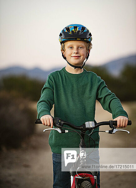 United States  California  Mission Viejo  Portrait of boy (10-11) on bicycle