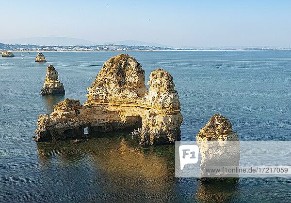 Rock formations in the sea  Ponta da Piedade  rugged sandstone coastline  Algarve  Lagos  Portugal  Europe