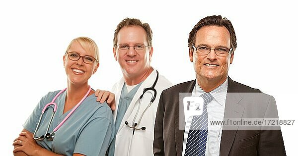 Smiling businessman with male and female doctor or nurse isolated on a white background