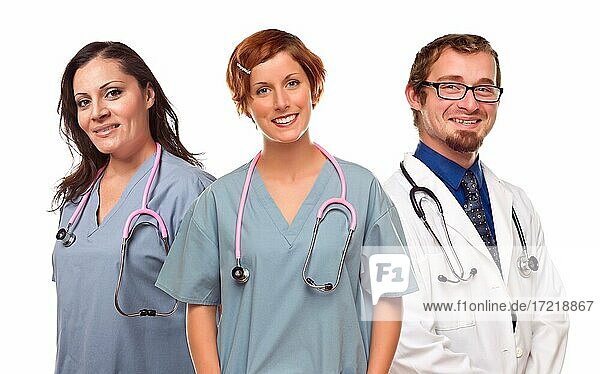 Group of smiling male and female doctors or nurses isolated on a white background