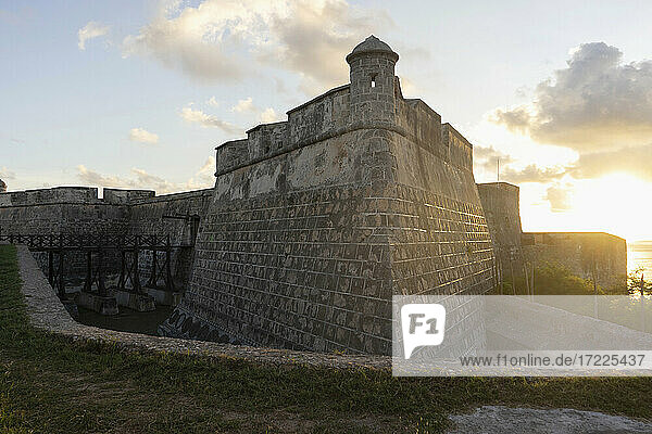 Ancient structure of Santiago de Cuba during sunset