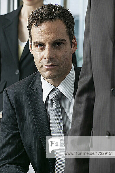 Portrait confident handsome businessman in suit