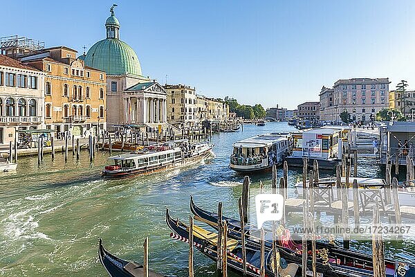 Gondolas and boats on the Grand Canal with church San Simeone Piccolo at the Ponte degli Scalzi  Venice  Veneto  Italy  Europe