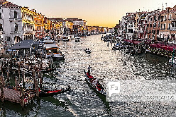 Evening atmosphere  gondolas on the Grand Canal at the Rialto Bridge  Venice  Veneto region  Italy  Europe