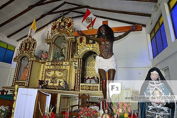 Indigenous Jesus on the cross in the village church Iglesia Virgen Del Carmen  Aguas Calientes  Machu Picchu  province Urubamba  Peru  South America