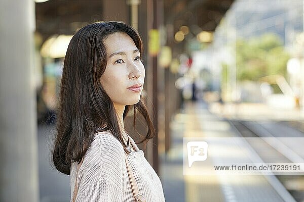 Young Japanese woman at the station