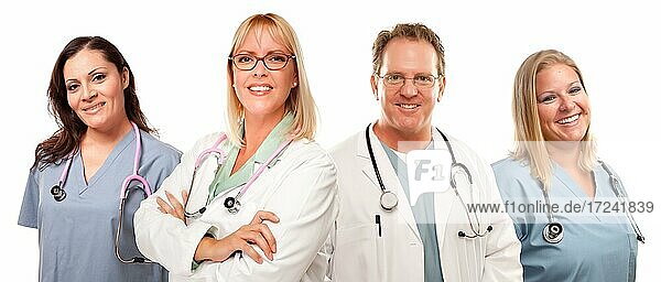 Smiling male and female doctors or nurses before a white background