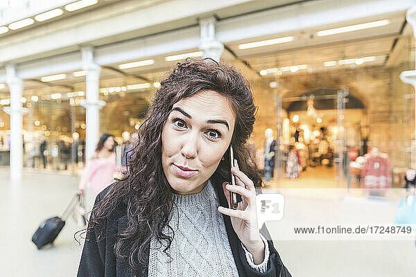 Mid adult businesswoman talking on mobile phone