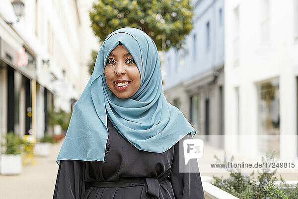 Smiling woman wearing hijab