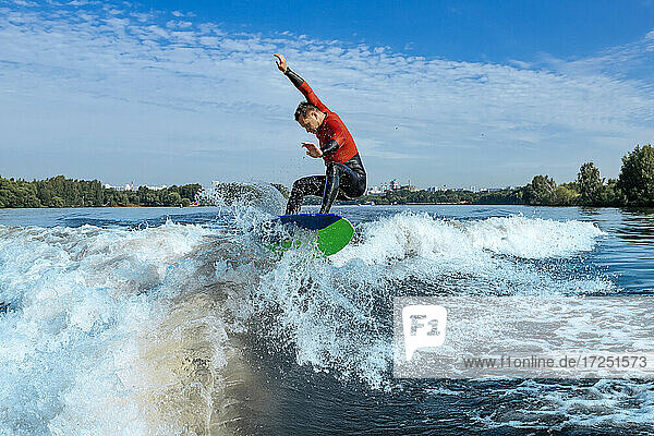 Man wakesurfing in Moskva river