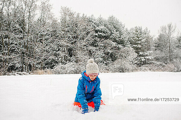 Canada  Ontario  Boy playing in snow