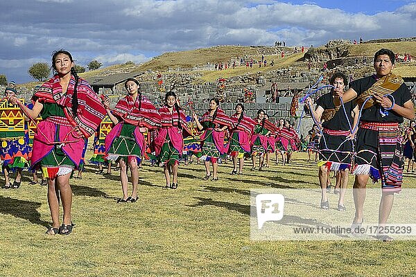 Inti Raymi  festival of the sun  dance group in front of the sanctuary  ruins of the Inca Sacsayhuamán  Cusco  Peru  South America