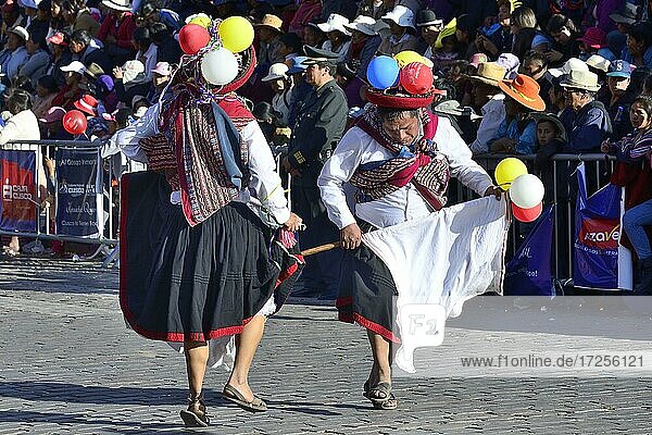 Two dancers at the parade on the eve of Inti Raymi  Festival of the Sun
