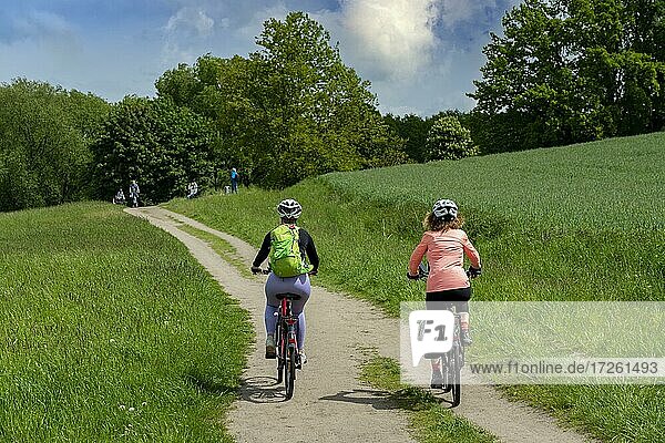 Girlfriends on a bike ride in the north of Berlin  Berlin  Germany
