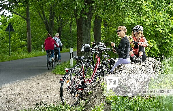 Girlfriends on a bike ride in the north of Berlin  Berlin  Germany