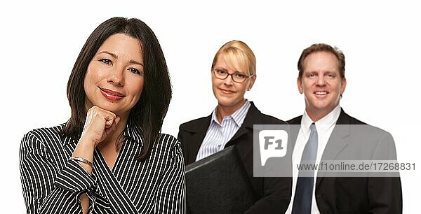 Hispanic woman in front of businesspeople isolated on a white background