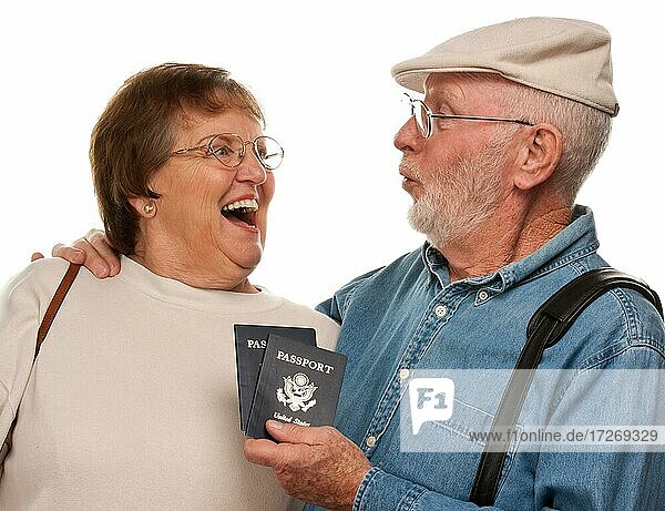 Happy senior couple with passports and bags isolated on a white background