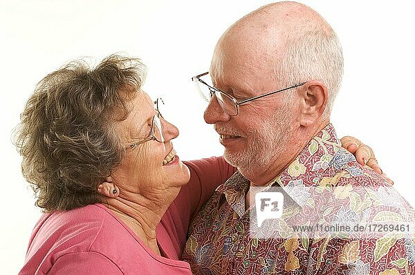 Happy senior couple romantically dancing
