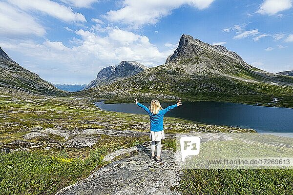 Little girl enjoying the view over a glacial valley  Trollstigen mountain road  Norway  Europe