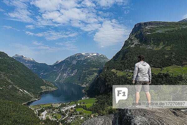 Man overlooking Geirangerfjord  Sunmore  Norway  Europe