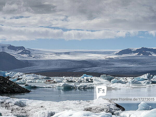 Icebergs floating in Jokulsarlon lake situated at head of Breidamerkurjokull glacier