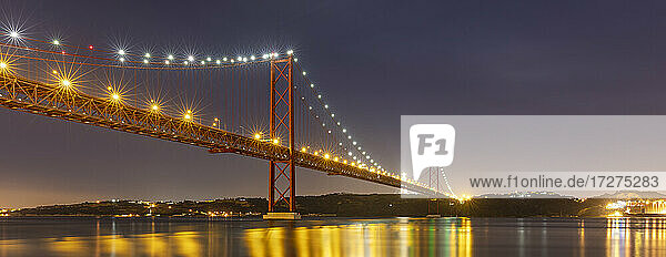 Portugal  Lisbon District  Lisbon  Panorama of 25 de Abril Bridge at dusk