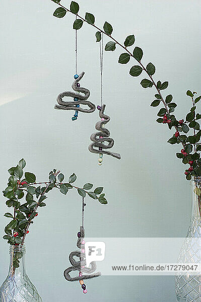 DIY Christmas decorations made of felt  strings and beads